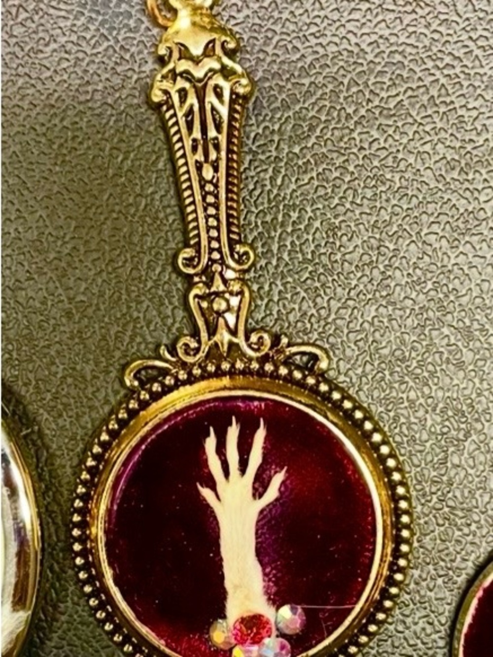 Vintage-Inspired Gold Tone Mouse Paw Pendant with Burgundy Velvet